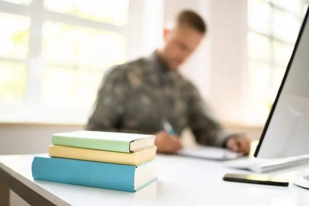 Blurred background of a person writing in military uniform